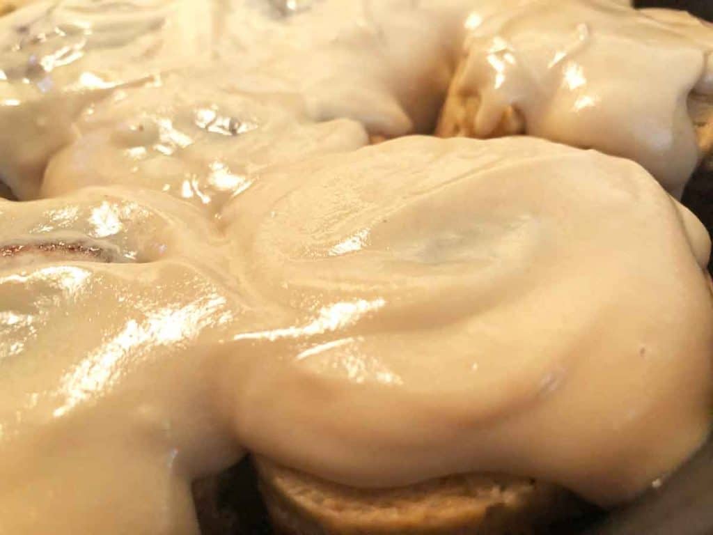 Einkorn sourdough chocolate maple cinnamon rolls topped with vegan cream cheese frosting. 